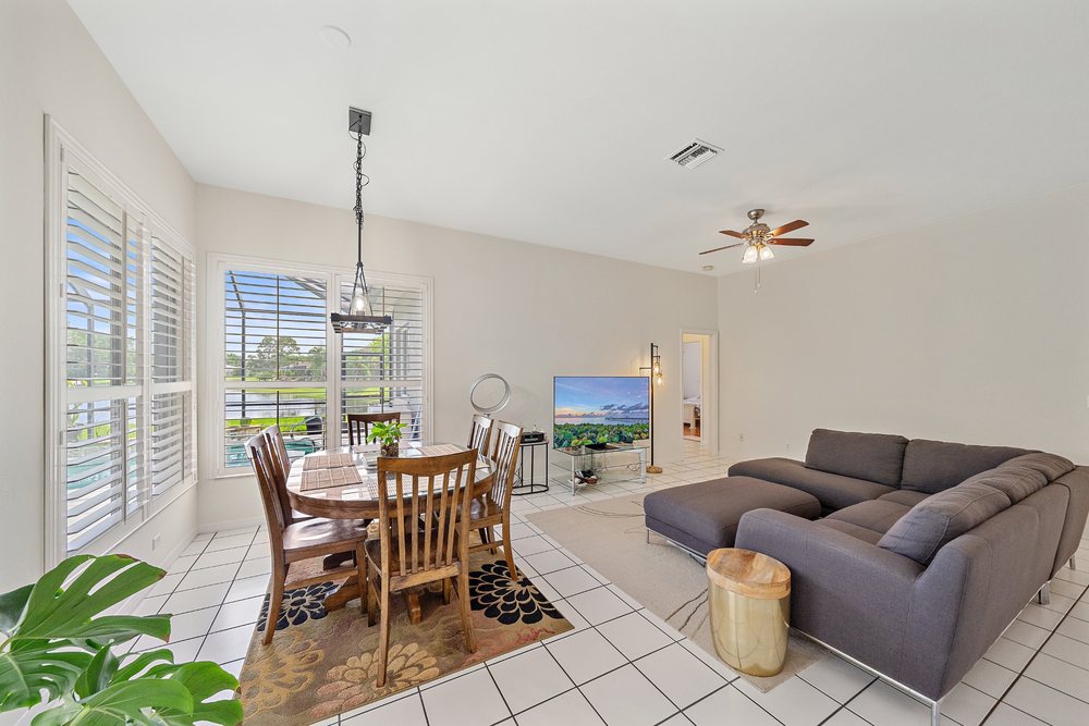 A bright living and dining area, clean and ready to show